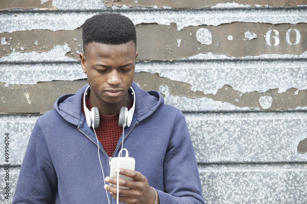 Teenager on his phone.